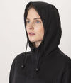 Woman wearing Leblok EMF protective zipped hoodie with the hood on
