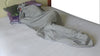 A person sleeping in EMF protective sleeping bag from Leblok