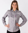A woman wearing a long-sleeved grey EMF shirtfrom Leblok