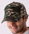 Man wearing camouflage version of Leblok cap