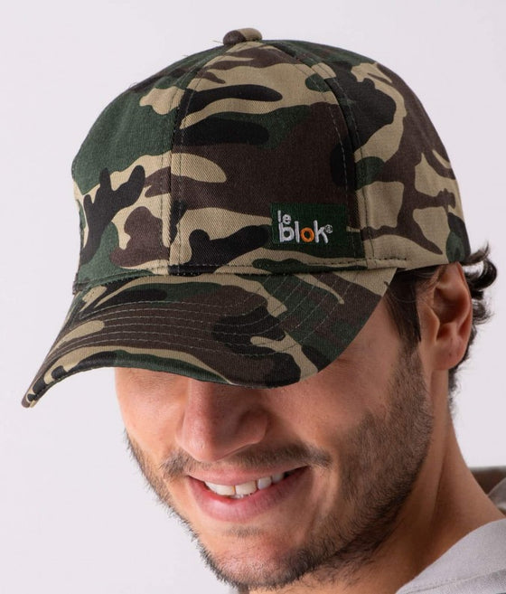 Man wearing camouflage version of Leblok cap