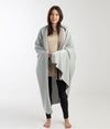 EMF blanket by Leblok in grey on a person