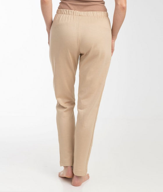 Back of Lebok EMF protective beige leggings on a model