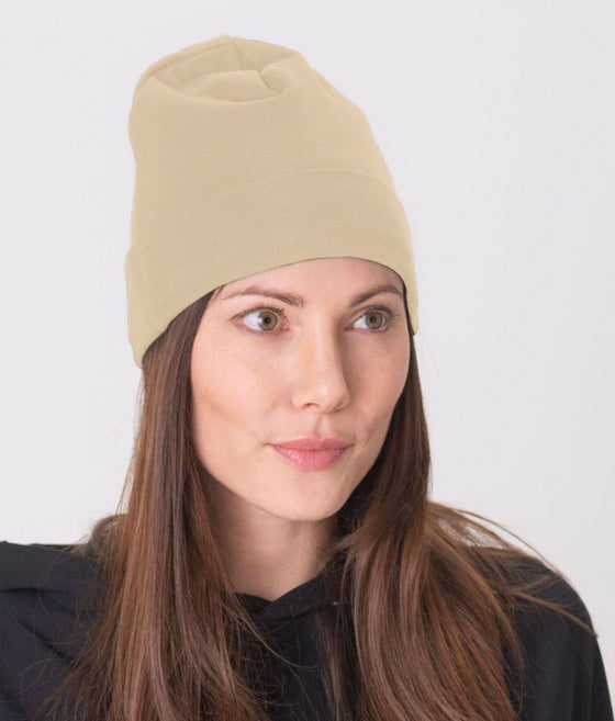 Leblok EMF shielding beanie in beige on a model