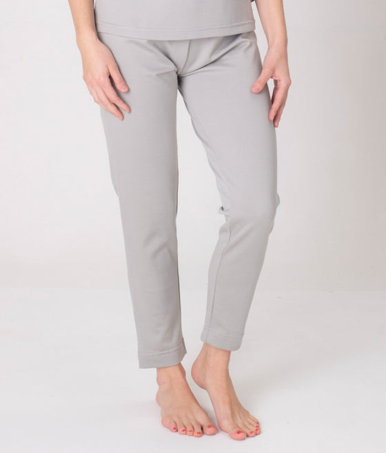 A pair of grey leggings Leblok from EMF protective fabric, displayed on a person