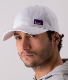  Men wearing Leblok EMF Shielding Cap in White