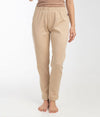 A pair of beige, EMF protective women's leggings made from stretch RF blocking fabric