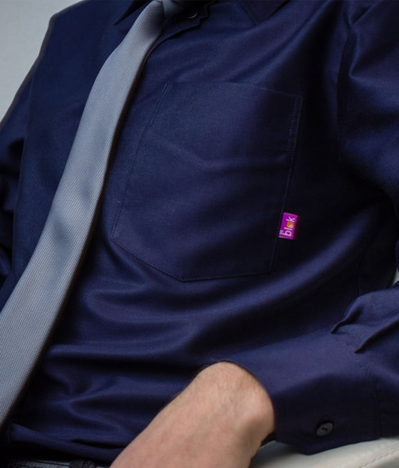 A man wearing EMF blocking Leblok shirt with a tie