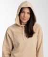 Leblok EMF hoodie pullover in beige on a model - hood up