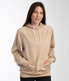 Leblok EMF hoodie in beige on a woman - hood down