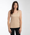 A woman wearing EMF reflective beige vest by Leblok